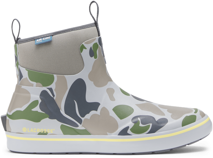 a pair of ankle height rubber boots in duck camo