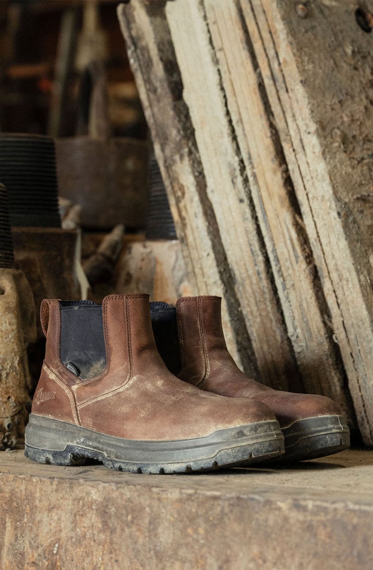 pair of work boots at a construction project