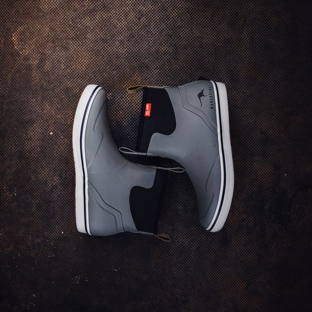 LaCrosse x Marsupial deck boots with a white midsole and gray upper shown in profile