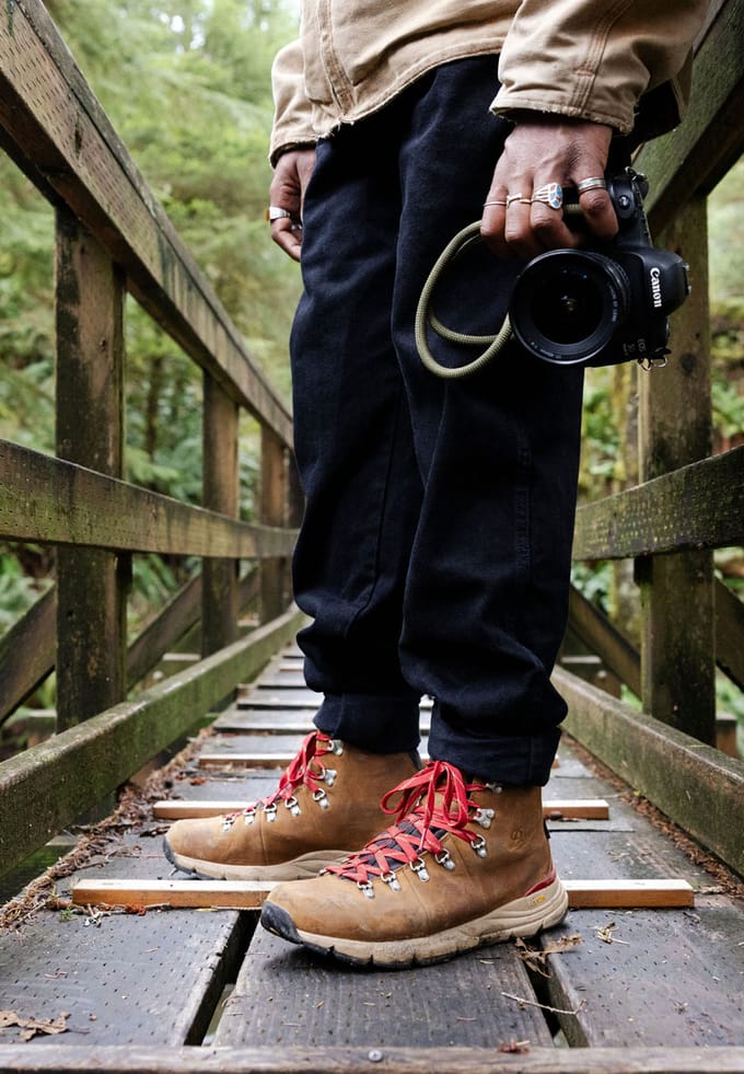 closeup of a pair of brown and red hiking boots