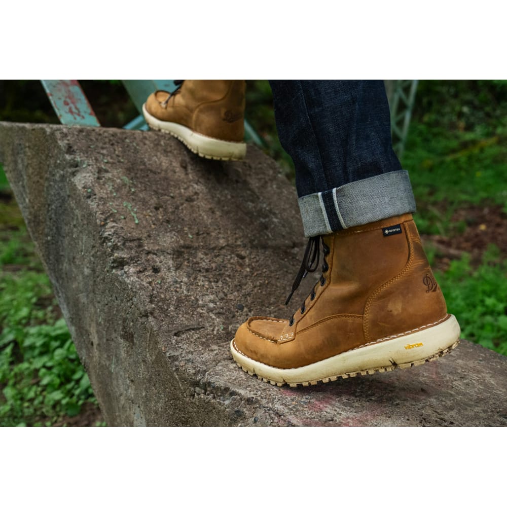 Lower body view of individual walking in concrete