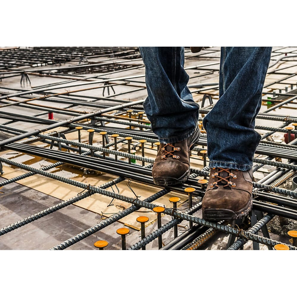 Lower body view of construction worker in a building site