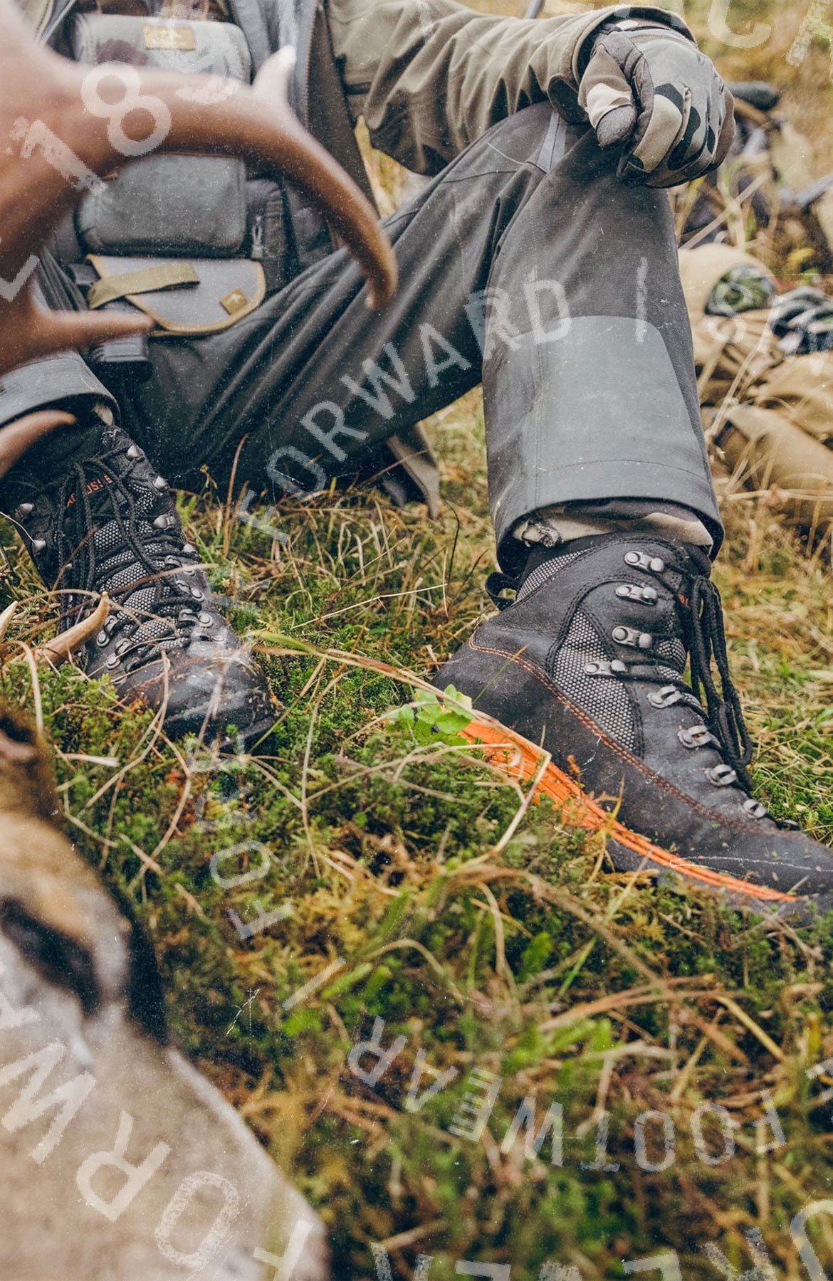 A man in leather hunting boots